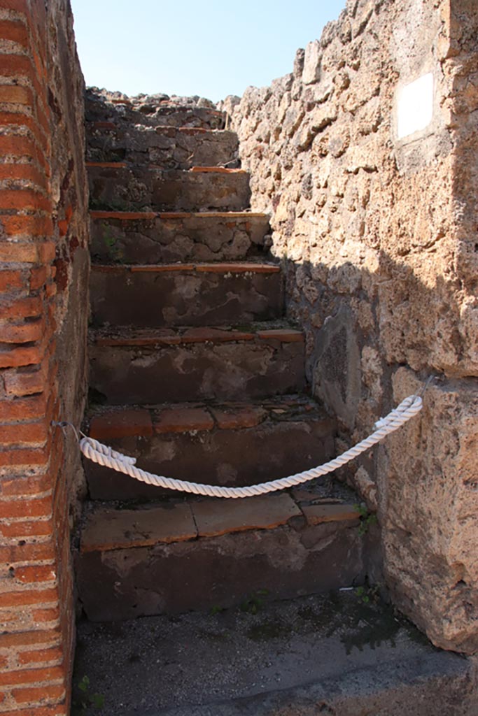 VI.7.12 Pompeii. October 2022. 
Looking west towards steps to upper floor. Photo courtesy of Klaus Heese.

