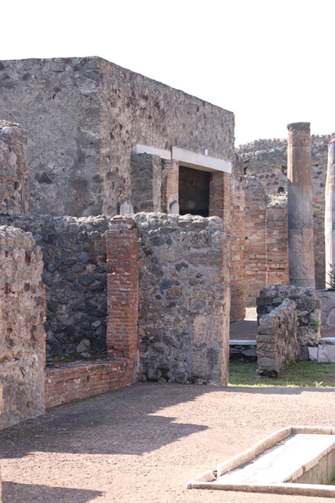 VI.7.18 Pompeii. December 2006. Doorways to rooms on south side of atrium.

