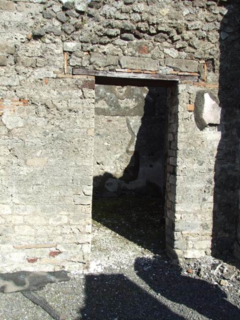 VI.8.20 Pompeii. March 2009.  Room 7.   Doorway on East side of peristyle.