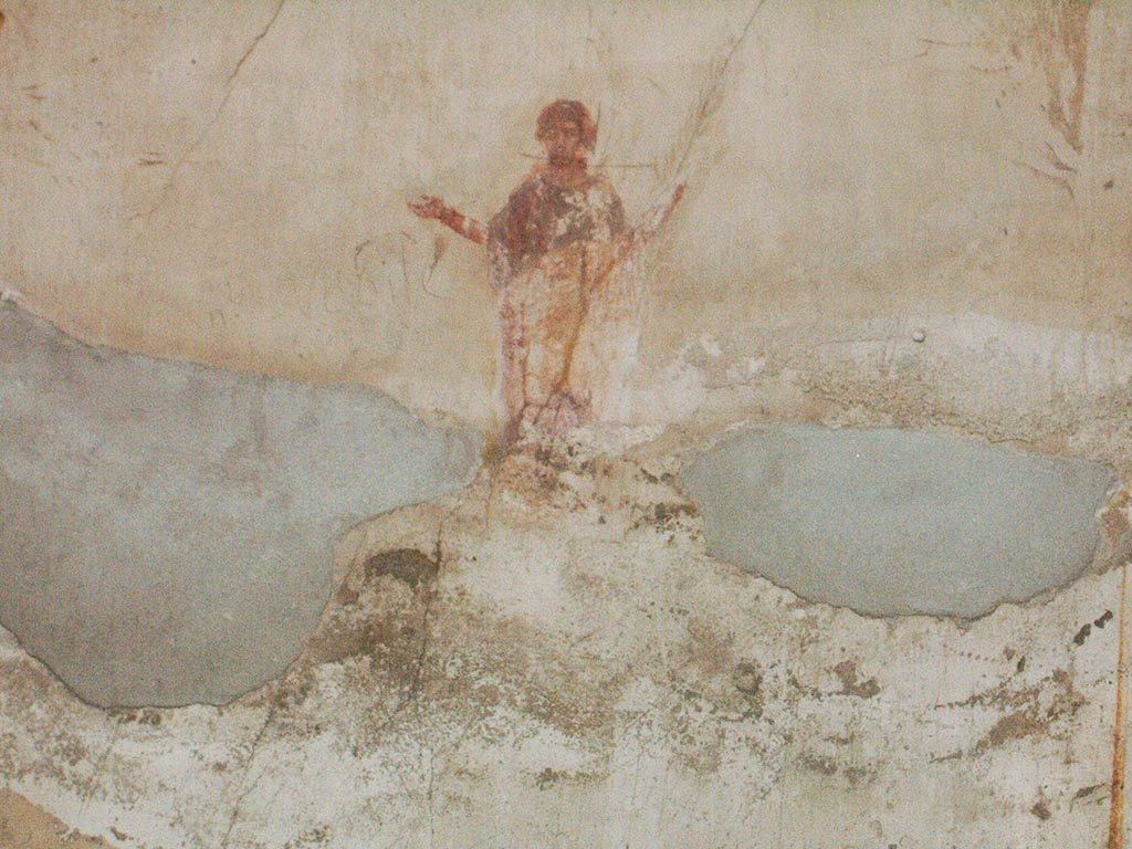 VI.8.23 Pompeii. May 2005. Painted flying female figure in centre of north wall of ala.