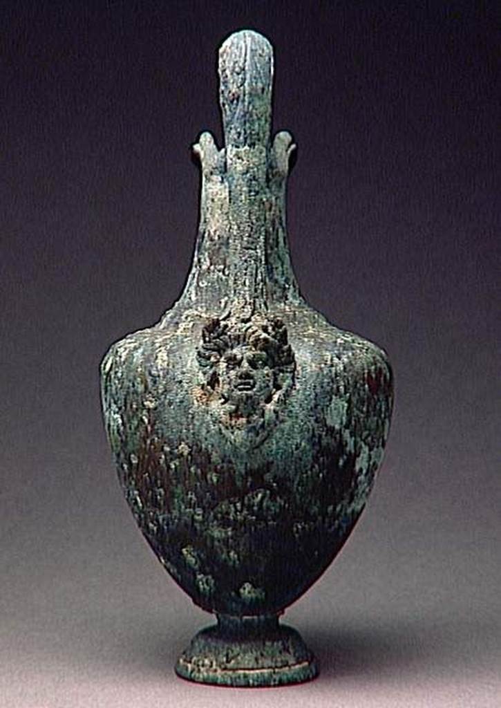 VI.9.1 Bronze jug with head of Gorgon, height 0.25m.  OA 1150 Cruche  embouchure oblique en fer  cheval, muse Cond, photo RMN  R.G. Ojeda
