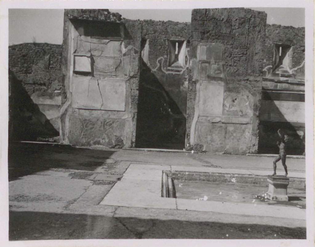 VI.12.2 Pompeii. Pre-1943. Looking across Tuscan atrium towards three doorways on west side of atrium. 
The room 5 in south-west corner is on the left. The second room 31 is in the centre.
See Warscher, T. (1946). Casa del Fauno, Swedish Institute, Rome. (p.16, n.18).
