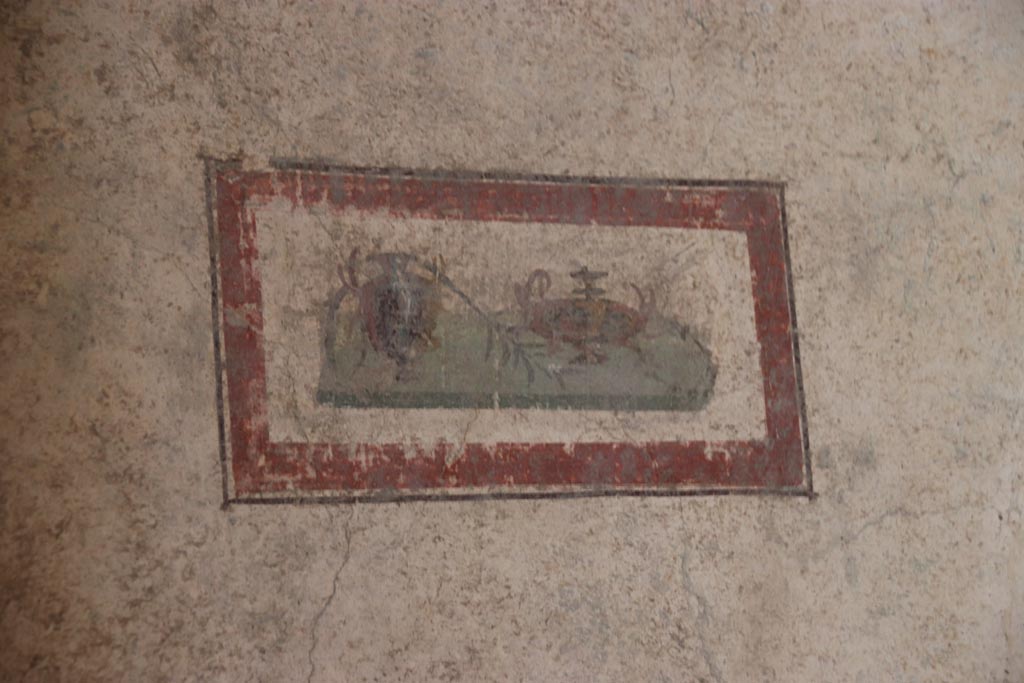 VI.15.1 Pompeii. October 2023. Painted panel from south end of west wall. Photo courtesy of Klaus Heese.
