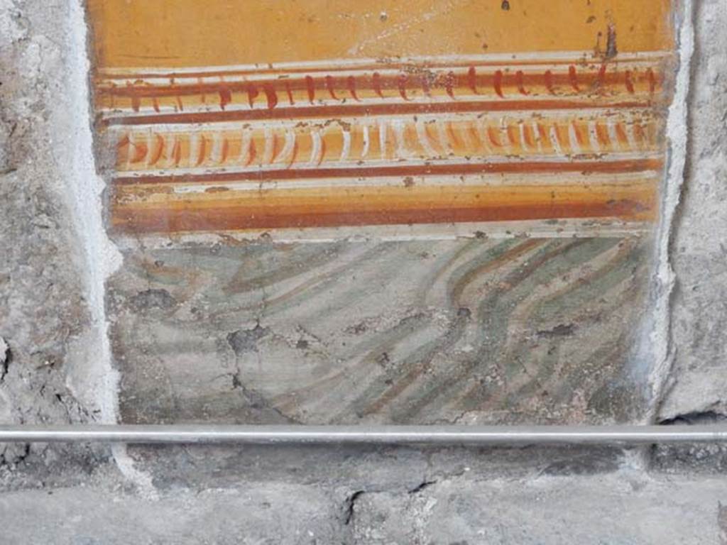 VI.15.1 Pompeii. May 2017. 
Detail from painted panel on north end of lower west wall of atrium, leading onto peristyle. Photo courtesy of Buzz Ferebee.


