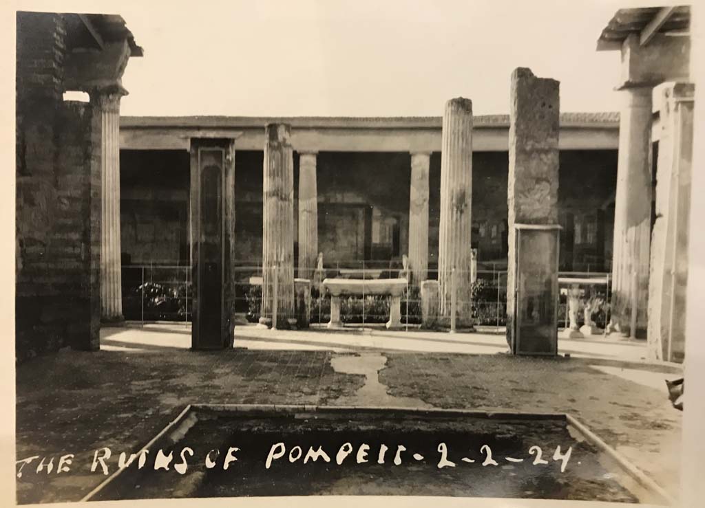VI.15.1 Pompeii. 2nd February 1924. Looking west from impluvium in an unroofed atrium towards peristyle. 
Photo courtesy of Rick Bauer.


