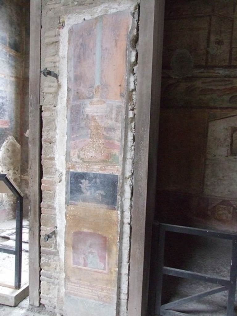 VI.15.1 Pompeii. December 2006. Detail of painting in atrium and doorway to bedroom on left of main entrance.
