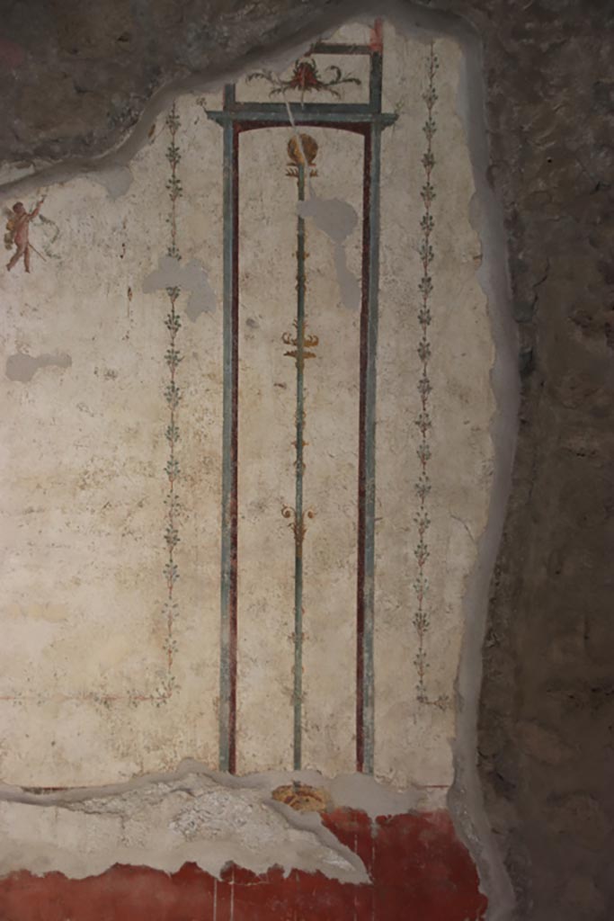 VI.15. I Pompeii. October 2023. 
Painted candelabra in central panel on south wall. Photo courtesy of Klaus Heese.
