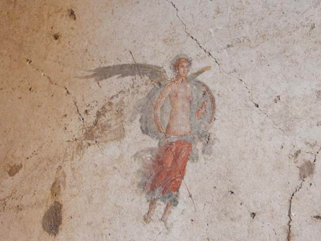 VI.15.1 Pompeii. May 2017. Detail of figure from central panel on west wall.  Photo courtesy of Buzz Ferebee.
