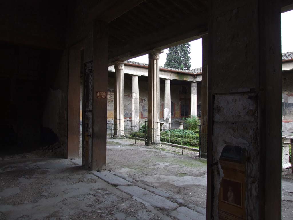 VI.15.1 Pompeii. December 2006. Looking south-west to peristyle from atrium.