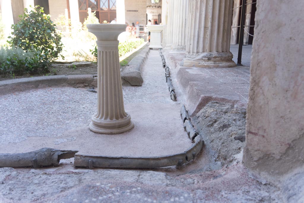 VI.15.1 Pompeii. August 2023. Looking north along gutter on east side of peristyle garden. Photo courtesy of Johannes Eber.