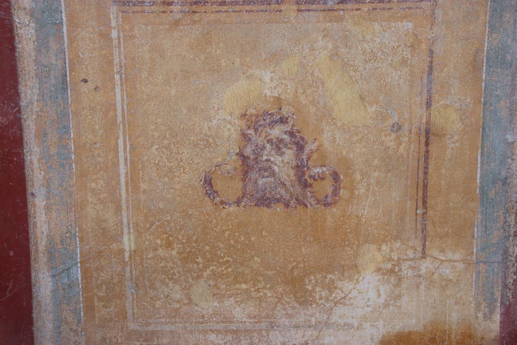 VI.15.1 Pompeii. October 2023. Detail from panel on south wall of peristyle. Photo courtesy of Klaus Heese.
