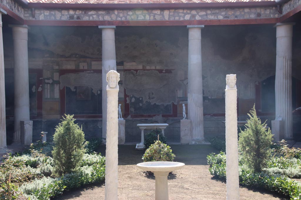 VI.15.1 Pompeii. October 2023. 
Peristyle, looking towards south portico wall across garden from north portico. Photo courtesy of Klaus Heese.
