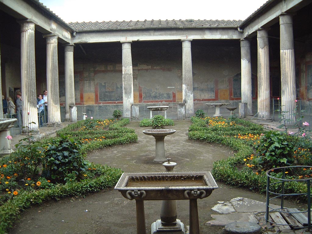 VI.15.1 Pompeii. Peristyle, looking towards south portico wall across garden in May 2001, from north portico. 
Photograph courtesy of Current Archaeology.
