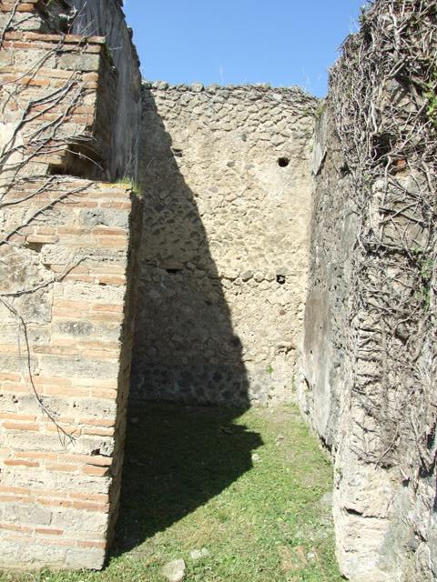 VI.15.5 Pompeii.  March 2009. Room 4. North west corner, and west wall with plaster.

