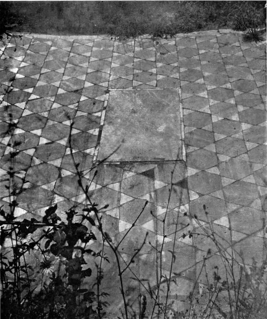 VI.15.14 Pompeii. c.1930. 
Tablinum flooring with site of a central emblema, and showing stars formed by bardiglio (grey) hexagons and palombino (white) triangles of marble.
See Blake, M., (1930). The pavements of the Roman Buildings of the Republic and Early Empire. Rome, MAAR, 8, (p.42 & Pl.7, tav.2).
