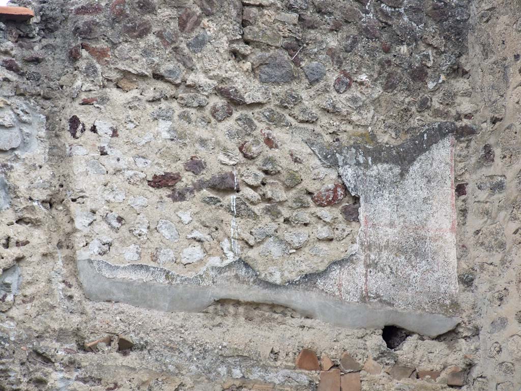 VI.16.1 Pompeii. December 2007. Remains of plaster at upper level in north-west corner.
