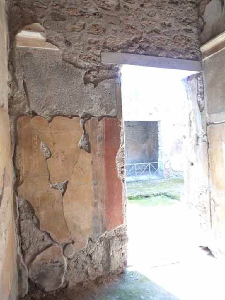 VI.16.7 Pompeii. May 2010. West wall of room D, with doorway to atrium.