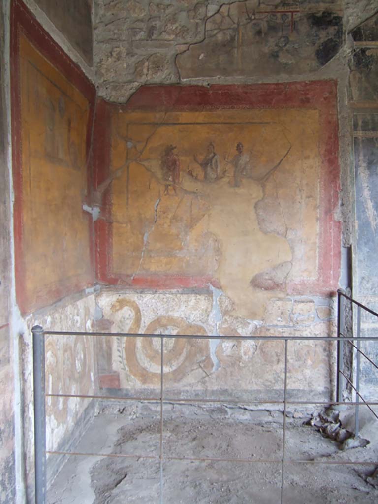 VI.16.7 Pompeii. May 2006. 
Room F, painting of the gods on the lararium on the south wall in the south-east corner of the peristyle.
