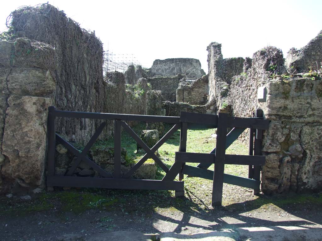 VI.16.12 Pompeii. March 2009. Entrance, looking west to rear.