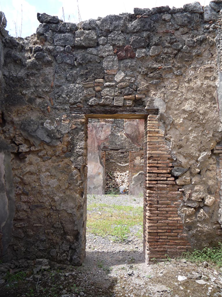 VII.1.36 Pompeii. October 2009. Looking towards doorway to atrium in west wall. Photo courtesy of Jared Benton.