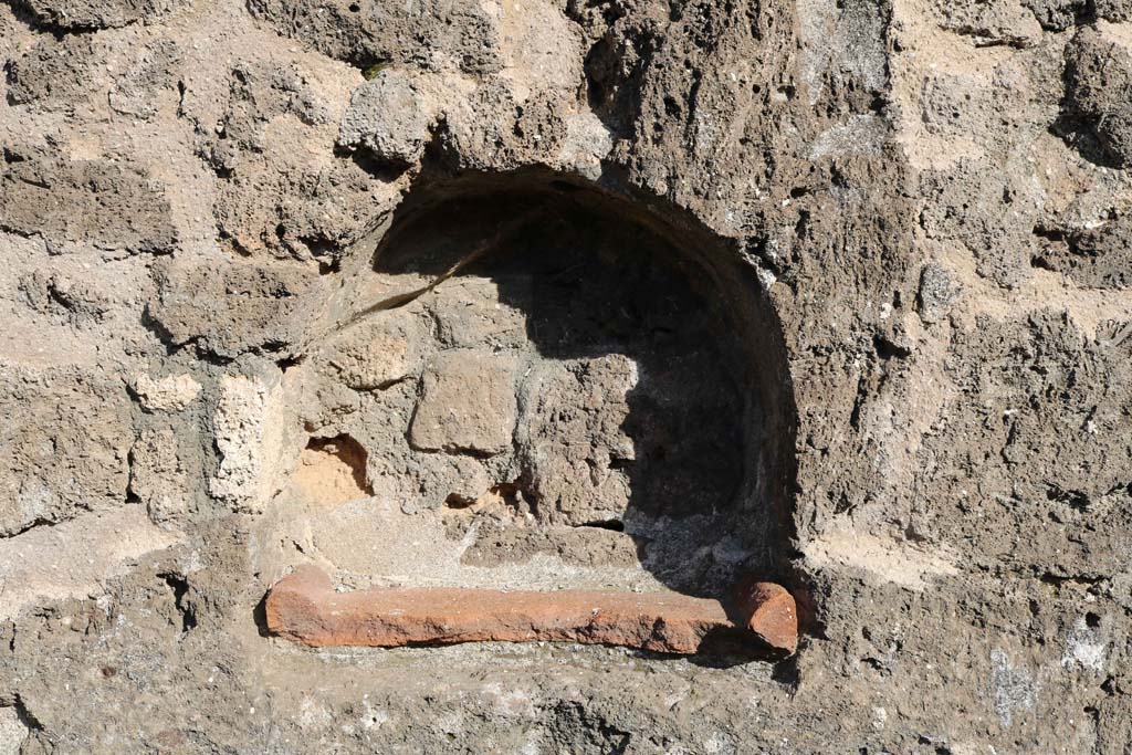 VII.3.12, Pompeii. December 2018. Niche set into east wall of shop. Photo courtesy of Aude Durand.