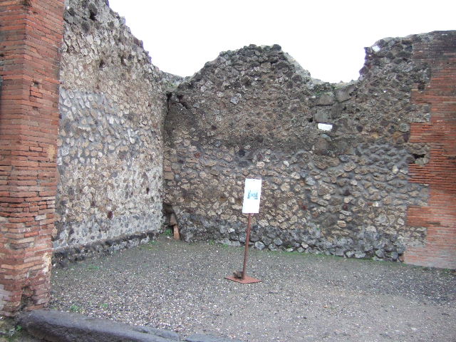 �Cornice in terracotta of a Compluvium preserved at Pompeii�.  
Old photograph courtesy of Society of Antiquaries, Fox Collection.
These are Grondaia or rainwater spouts that fed rainwater from the Compluvium in the roof to the Impluvium below.   These were reconstructed and displayed during the 19th century in VII.4.15/16 before the Antiquarium was opened. Mau says they were originally from a House near the Porta Marina,  The plan provided by Mau can be used to identify the house as VII.16.12/15 the House of Umbricius Scaurus. See Mau, A., 1907, translated by Kelsey F. W. Pompeii: Its Life and Art. New York: Macmillan. (p.251, p.253, p.298).