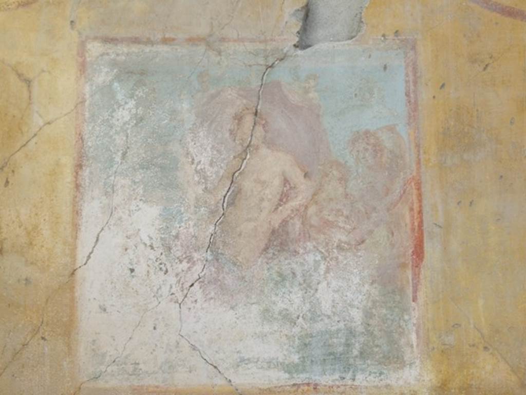 VII.4.31 Pompeii.  March 2009.  Room 12. Oecus. South wall. Remains of a Wall painting of Venus on a sea creature, with two Cupids unfolding her mantle as a sail. Venus is leaning on the shoulder of another figure, followed  by another Cupid playing the pipes.