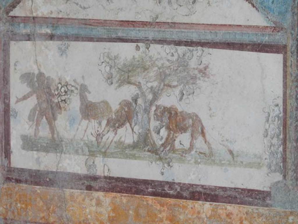VII.4.48 Pompeii. May 2015. Room 11, detail from south end of west wall in tablinum.
Photo courtesy of Buzz Ferebee.
