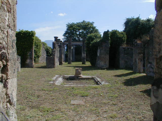 VII.4.57. Pompeii.  March 2009.  Room 1.  Atrium.  Looking south east to Tablinum and Peristyle.
