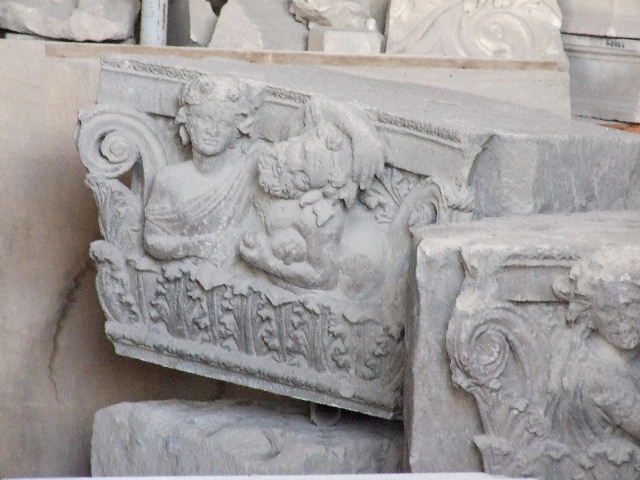 VII.4.57 House of the Figured Capitals.  Drunken satyr and a maenad on a capital. This faced the street on the top of right hand side of entrance.
