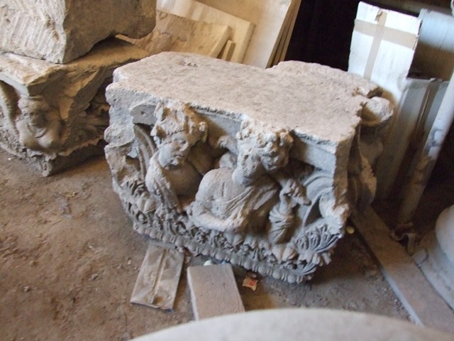 VII.4.57 House of the Figured Capitals.   Figures of a man and woman on a capital.  This faced in to the vestibule on the top of left hand side of entrance.
