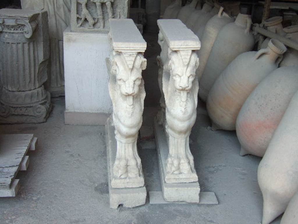 VII.7.29 Pompeii. December 2006. Pair of table supports in storage.