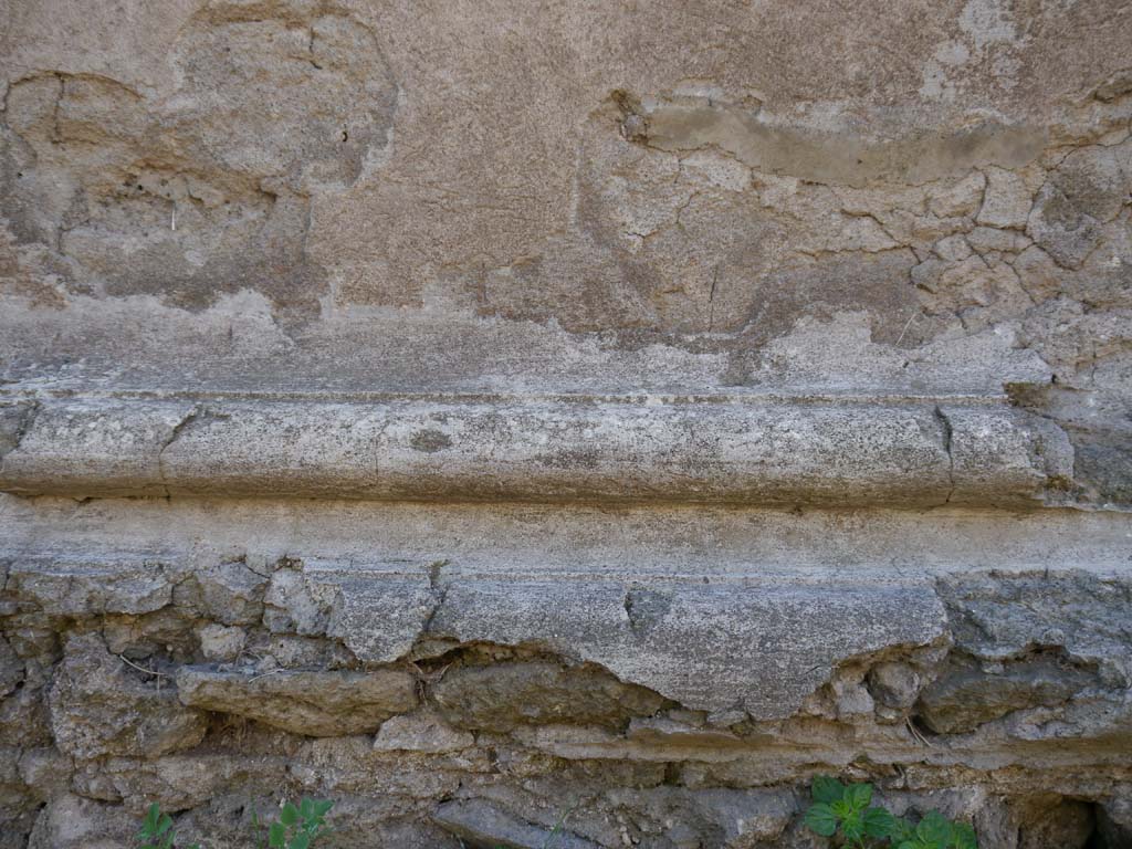 VII.7.32, Pompeii. September 2018. Detail from the north side of the podium base.
Foto Anne Kleineberg, ERC Grant 681269 DÉCOR

