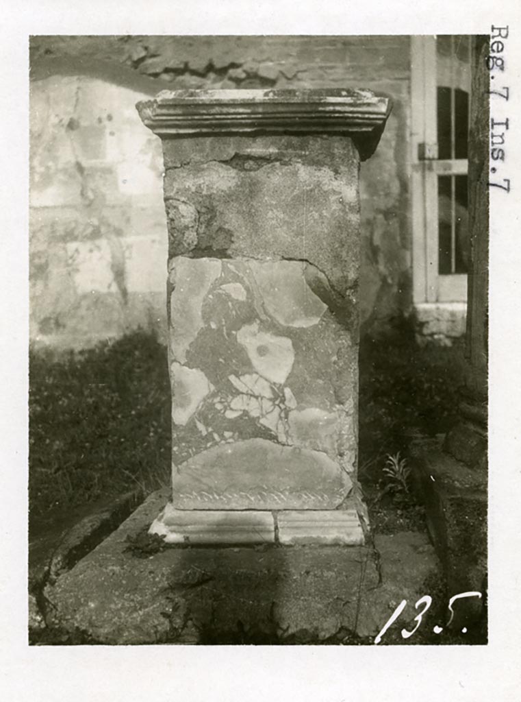 VII.7.32 Pompeii. Pre-1937-39. 
Looking north to statue base, presumably in north-east corner with doorway in rear north wall.
Photo courtesy of American Academy in Rome, Photographic Archive. Warsher collection no. 135.

