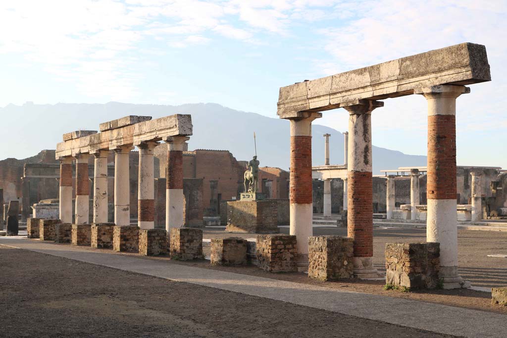 VII.8.00 Pompeii Forum, east side. December 2018. 
Looking south-west from rear of portico of Eumachia’s Buildings. Photo courtesy of Aude Durand.
