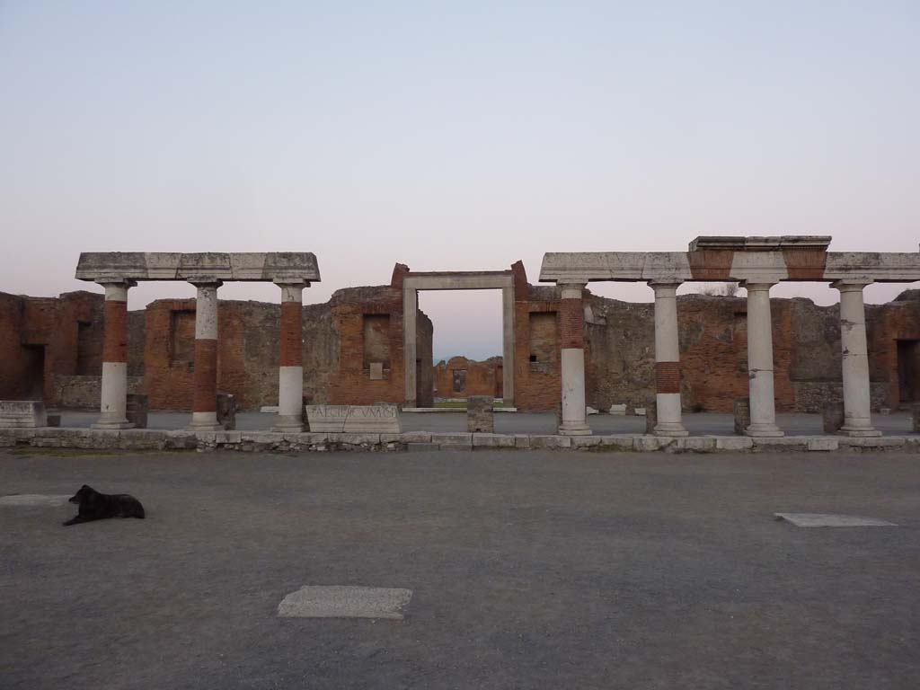 VII.9.1 Pompeii. October 2014. Looking east across Forum towards portico, and entrance doorway to Eumachia’s Building.  
Foto Annette Haug, ERC Grant 681269 DÉCOR.
