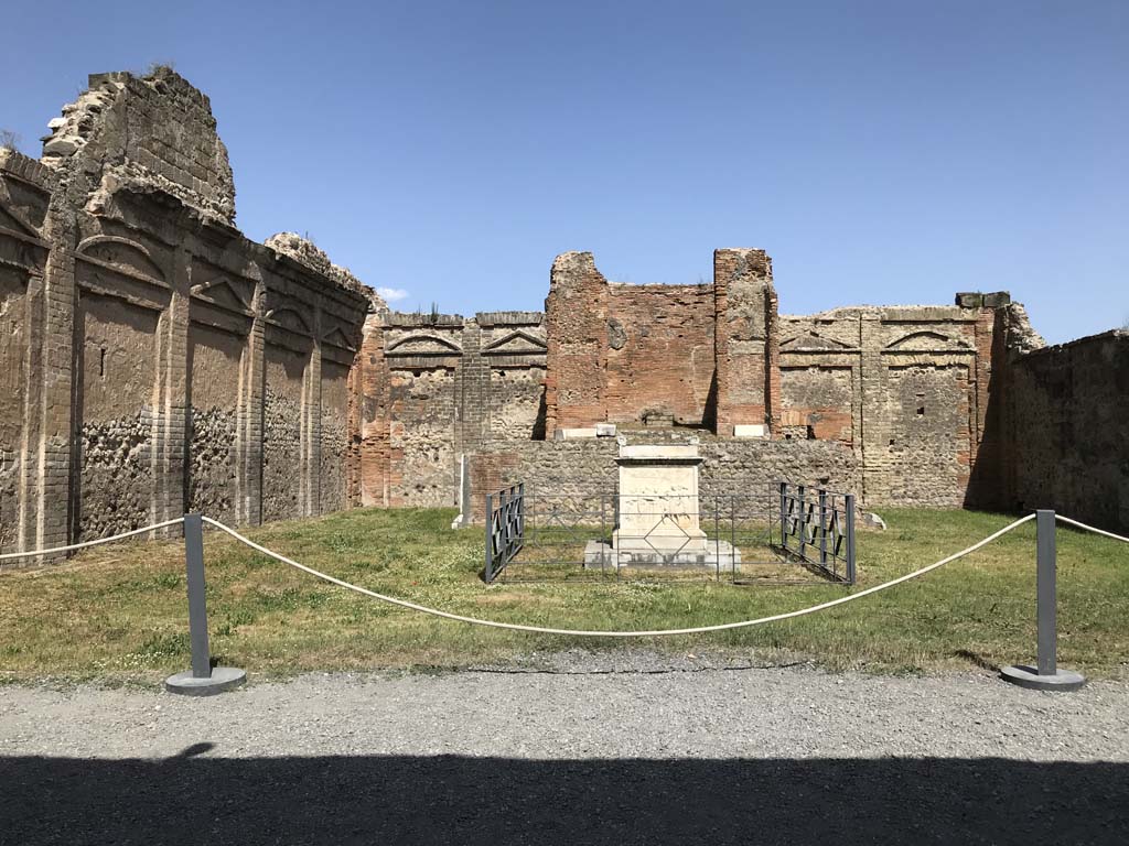 VII.9.2 Pompeii. April 2019. Looking towards east wall with cella and podium. Photo courtesy of Rick Bauer.