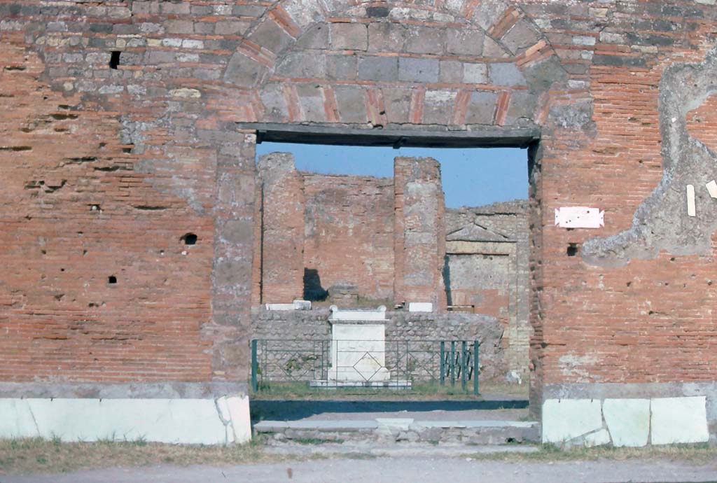 VII.9.2 Pompeii. September 2005.  Entrance on east side of Forum. According to Mau, at the time of the eruption in 79AD the entrance from the Forum had received its veneer of marble and was in a finished state. See Mau, A., 1907, translated by Kelsey F. W. Pompeii: Its Life and Art. New York: Macmillan. (Page 109).