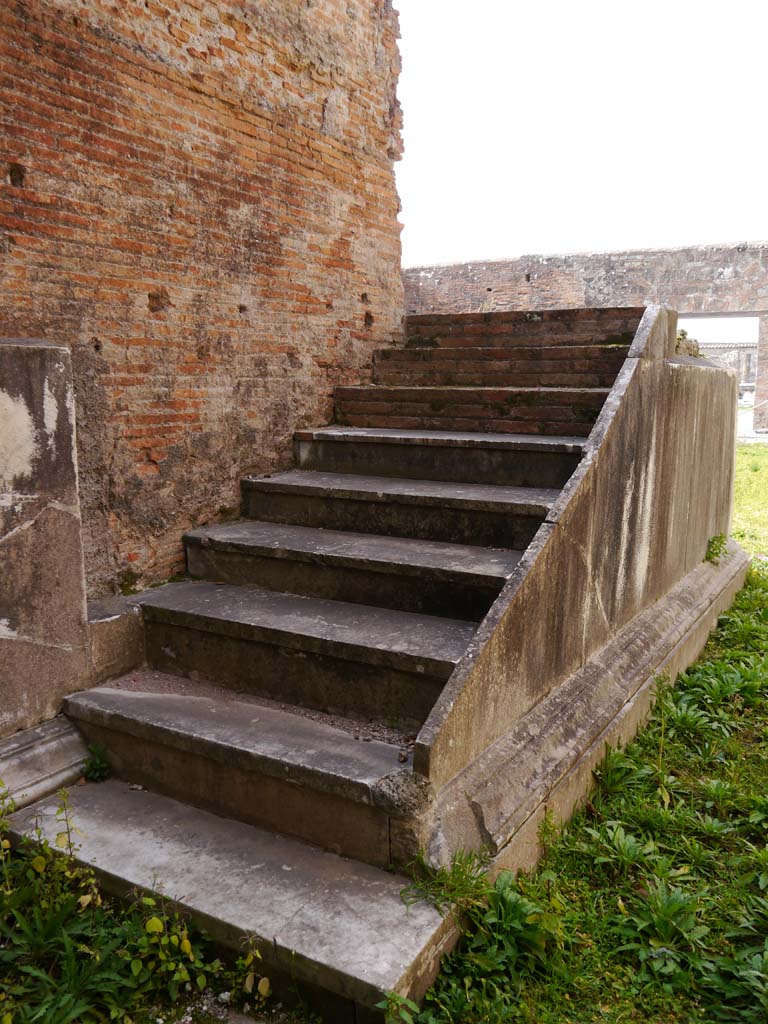 VII.9.2 Pompeii. March 2019. Steps at north end of podium to cella.
Foto Anne Kleineberg, ERC Grant 681269 DÉCOR.
