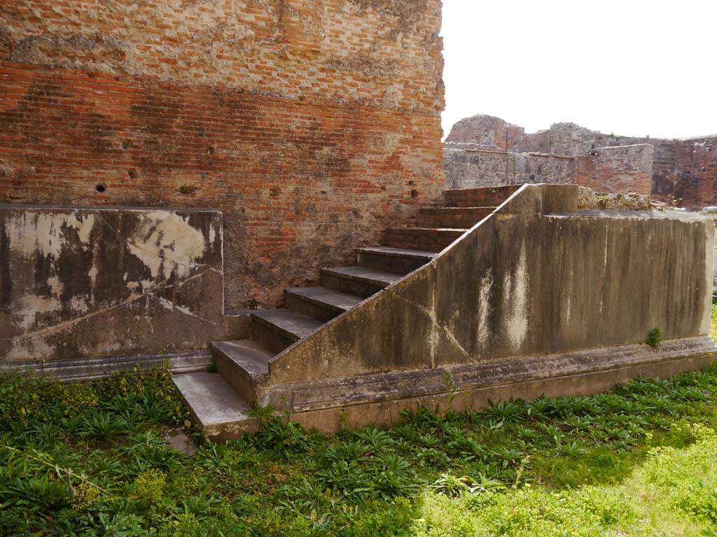 VII.9.2 Pompeii. July 2010. Steps to podium against north wall of cella. Photo courtesy of Rick Bauer.