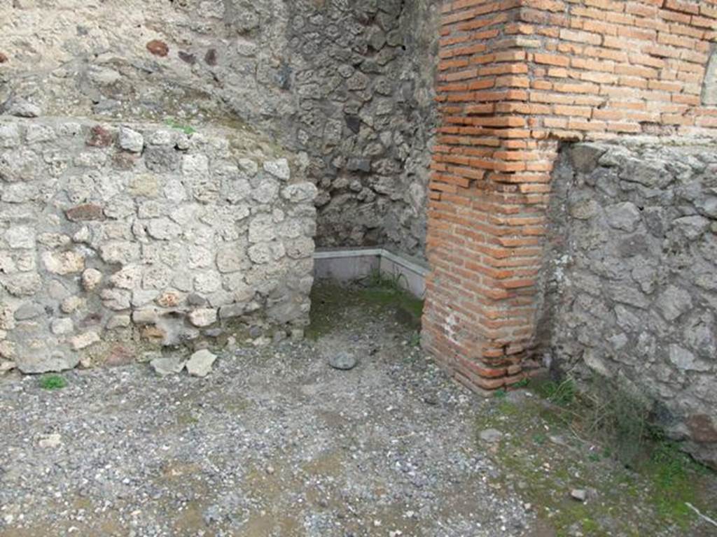 VII.9.4 Pompeii. December 2007. South-east corner with remains of marble surround.