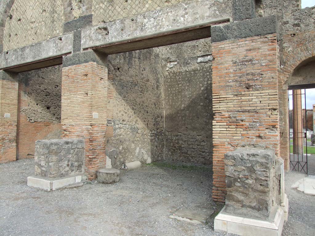 VII.9.9 Pompeii. December 2007. Entrance doorway with statue base on either side.