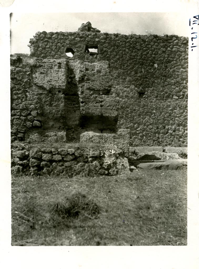 VII.12.1/37 Pompeii. Pre-1937-39. 
Looking west from VII.12.1 towards south side of doorway at VII.12.37 into Vicolo di Eumachia.
Photo courtesy of American Academy in Rome, Photographic Archive. Warsher collection no. 1836.
