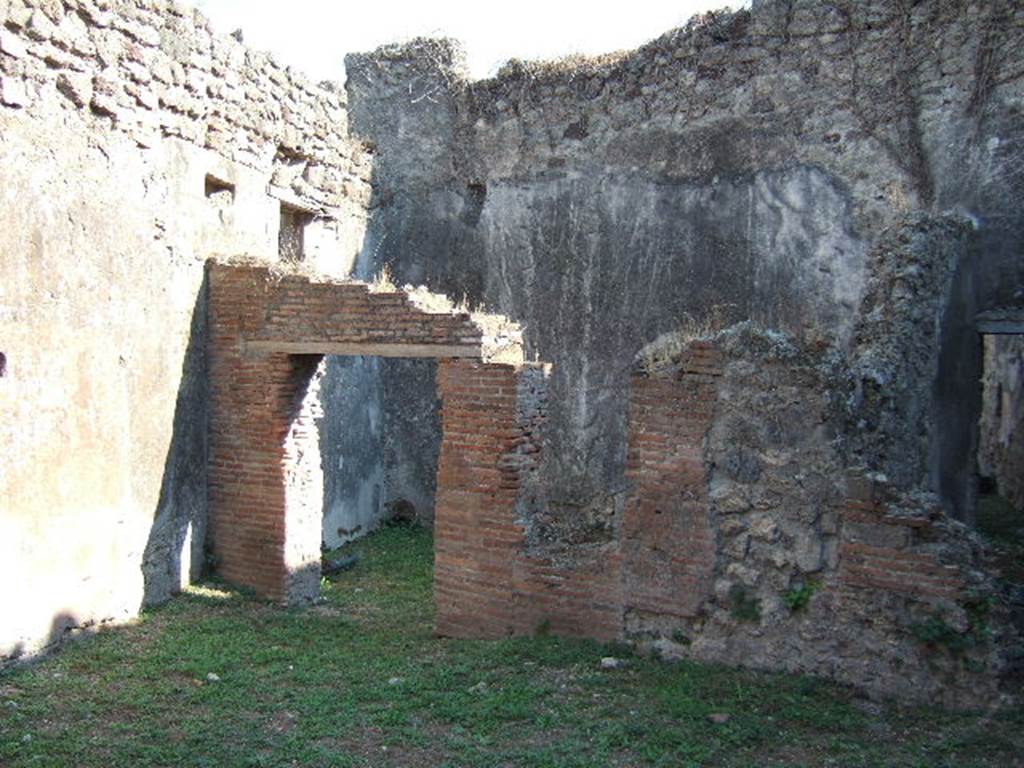 VII.12.14 Pompeii.  September 2005.  Room in south east corner of shop, with three windows.