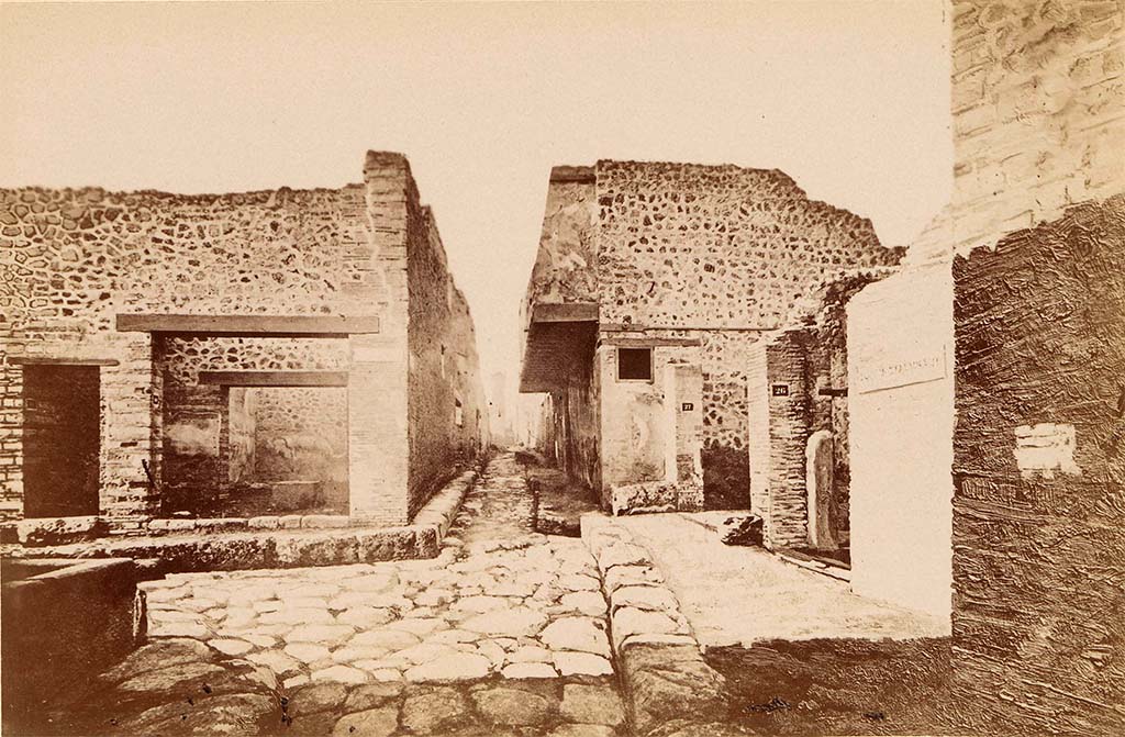 VII.12.28 Pompeii. Looking west c.1880, along Vicolo del Balcone Pensile with house on right.