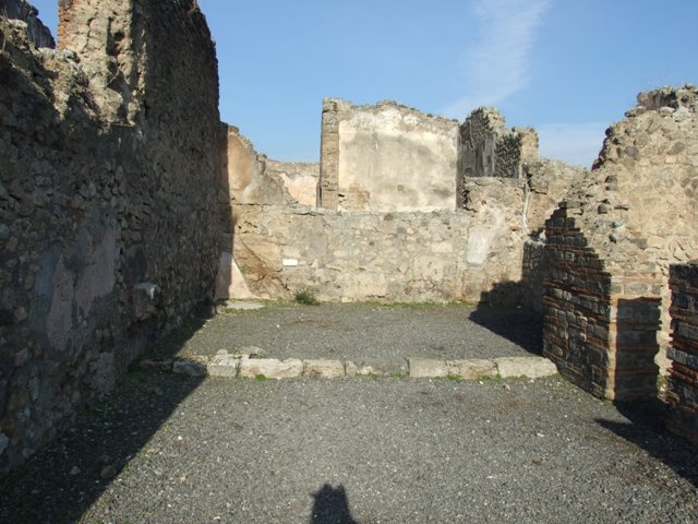 VII.14.6 Pompeii.  Shop.  East wall of rear room.