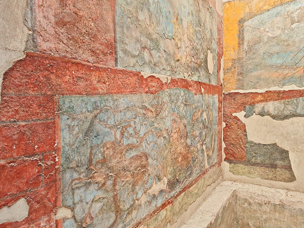 VII.16.a Pompeii. November 2023. Room 9, detail from west wall. Photo courtesy of Giuseppe Ciaramella.