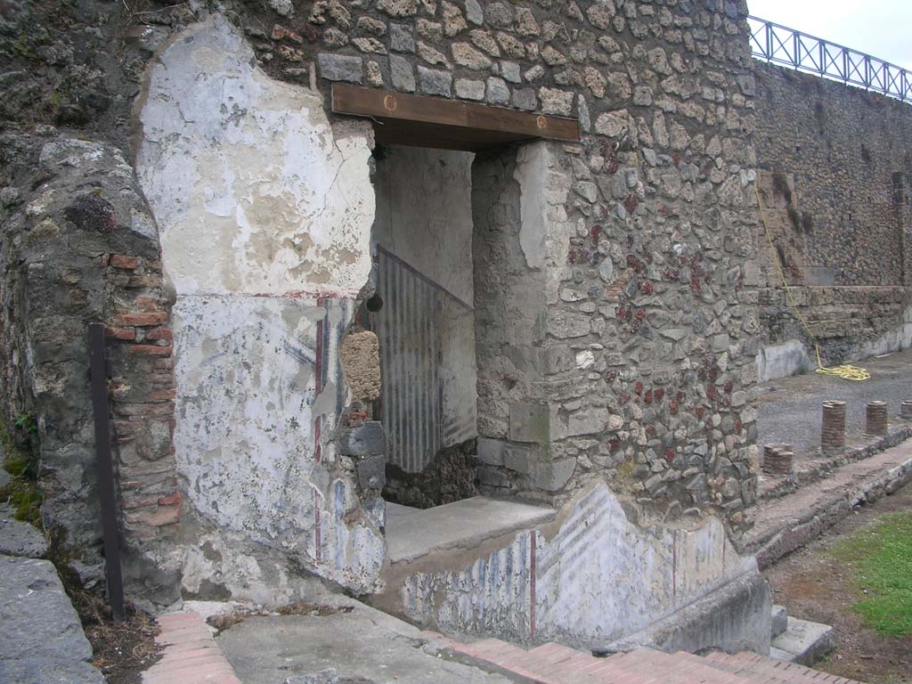 VIII.1.a, Pompeii. May 2011. Looking through window to steps, at north end of portico. Photo courtesy of Ivo van der Graaff.

