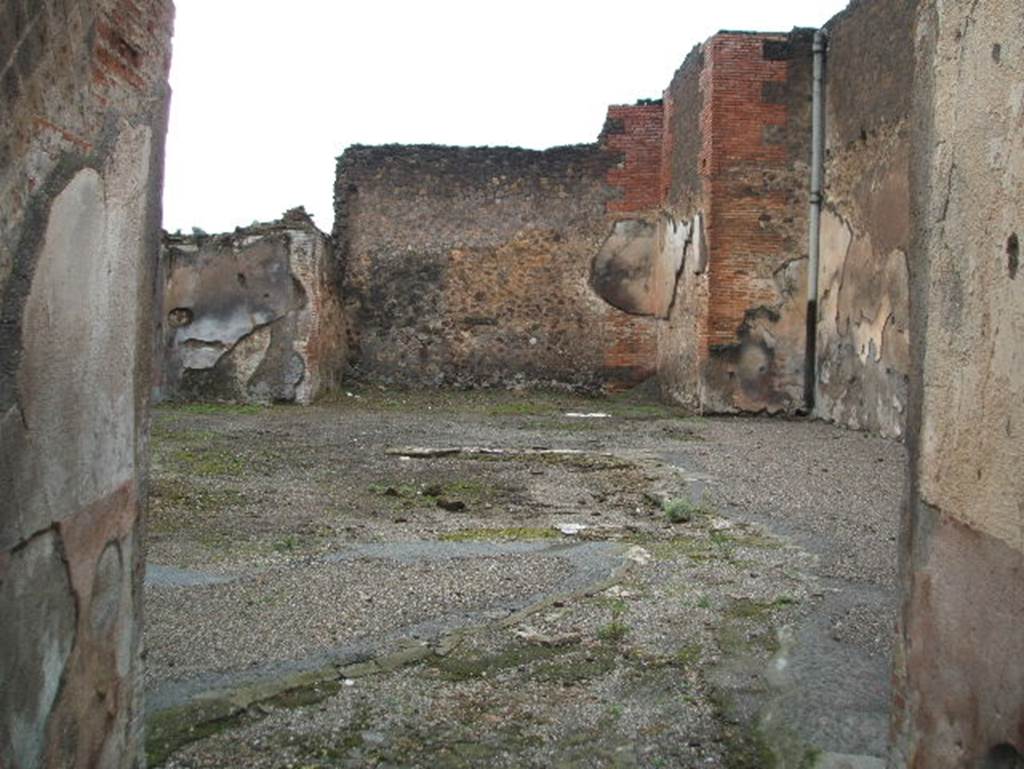 VIII.2.18 Pompeii. December 2004. Looking west across impluvium in atrium, from entrance corridor.