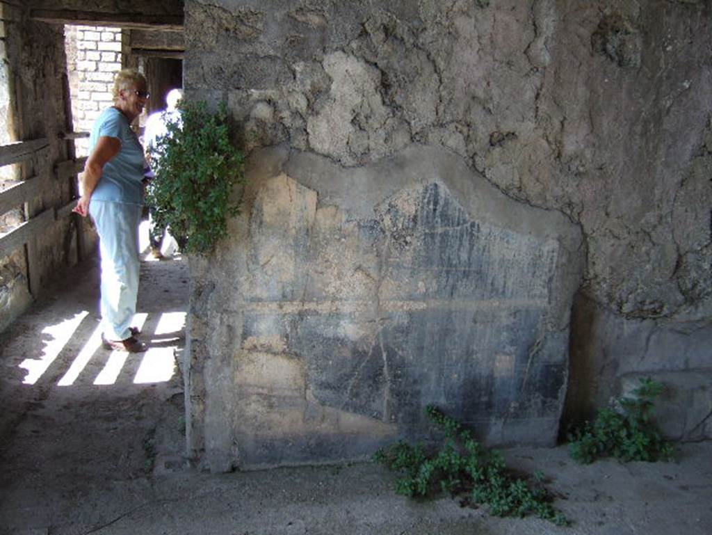 VIII.2.26 Pompeii. September 2005. Room 6, west wall of triclinium, looking west through narrow doorway along corridor.

